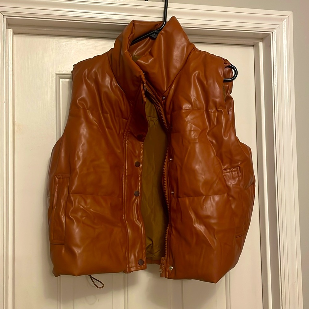 Brand new never worn pleather vest.